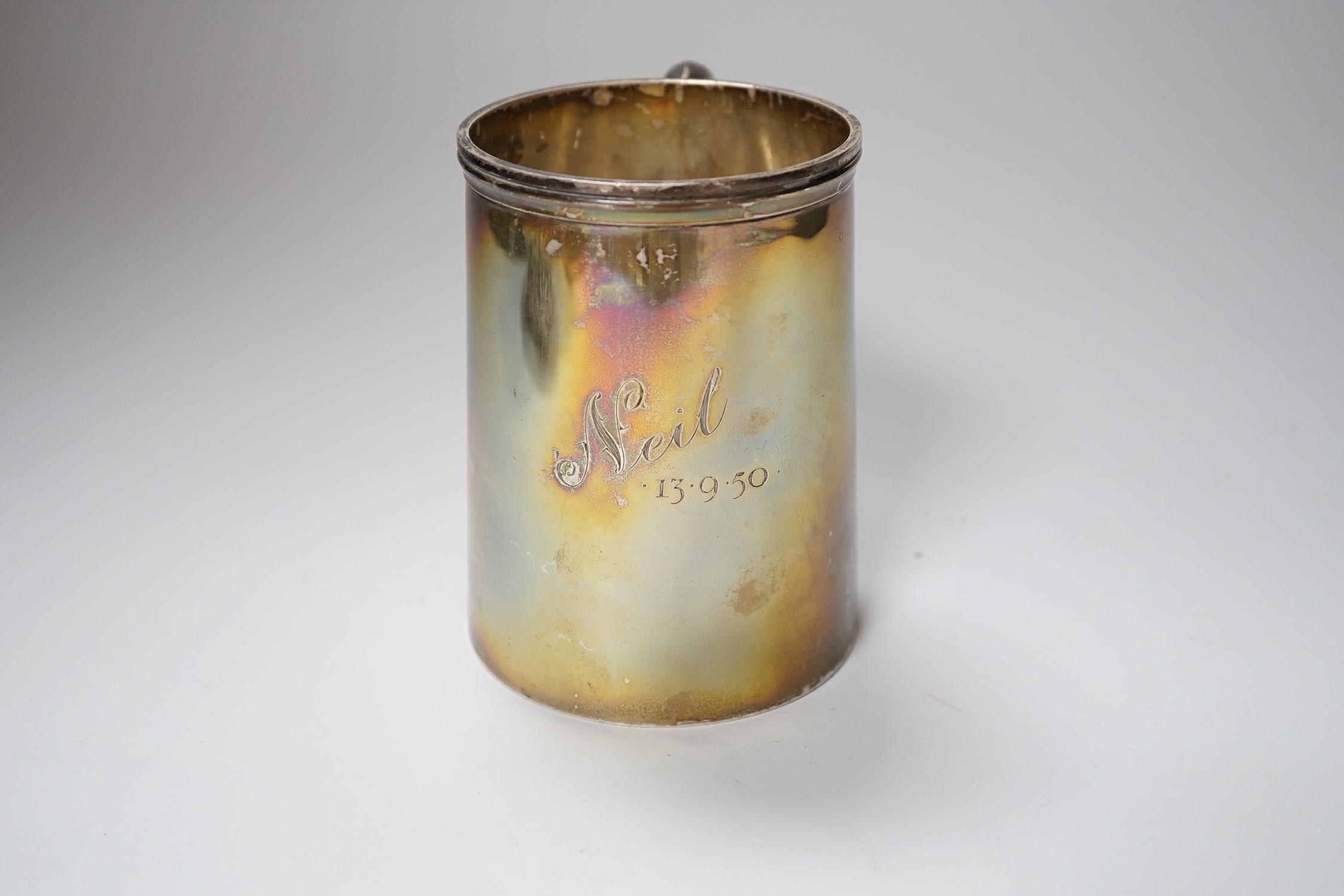 A George VI silver pint mug, of plain form, Birmingham 1945, 11.5cm, 390 grams